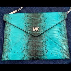 Micheal Kors Clutch. Teal & black faux snake skin